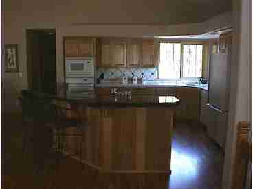 A view of the kitchen from the Living area in the Great Room.