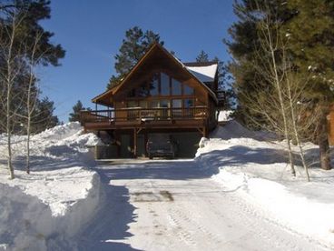 Large driveway for multiple vehicles. 2-Car garage