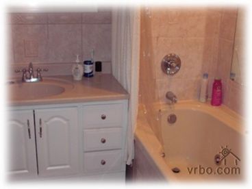 two bathrooms have garden tubs