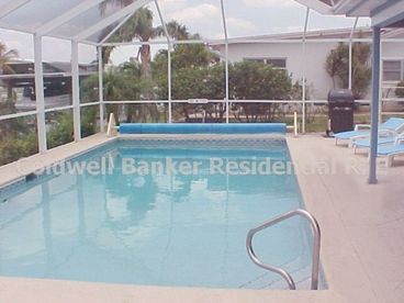 Heated pool with canal view