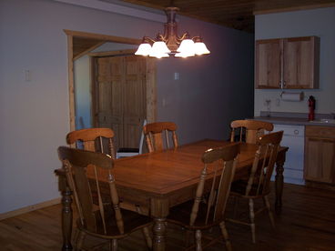 Fully equipped kitchen with dishwasher, dining room table that seats up to 8