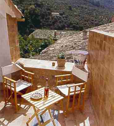 The sun terrace overlooks the roofs of the Castille del Munte