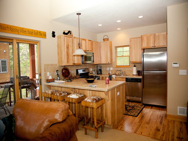 Well-appointed, stainless steel appliances, dishwasher, microwave, gas range.