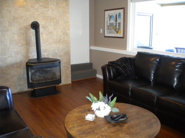 Bright and spacious living room with gas fireplace