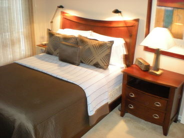 The bedroom has a queen-sized bed that will sleep two with plenty of closet space to hang up your clothes.  All linens and towels are provided with the condo.