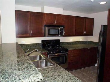 The kitchen includes stove, microwave, refrigerator, dish washer, cooking utensils and flatware needed if you decide to stay in and prepare a home cooked meal during your stay. The condo also has an in-unit washer & dryer for your convenience.