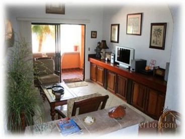 Living room of the premier two bath/bed 1,600 sq. ft condo on the water