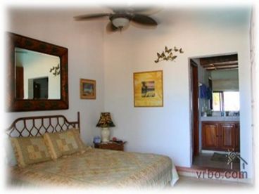 The master room that opens to large oceanfront balcony