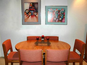 Seating for 6.  Our fully appointed kitchen has everything you need to serve a beautiful dinner or play one of the games we have for you.
