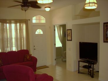 Living room w/ beautiful Sony Flat screen Tv and internet superfast wi-fi thru the entire home with outdoor patio grilling....