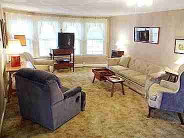 Relax in our cozy living room where you can enjoy a video or favorite television program. In the winter, curl up with a good book and cup of hot cocoa while you arm yourself by the wood burning stove. 