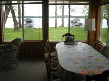 Dining table in front room with lake front view