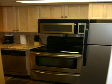 Nice Kitchen with stainless steel appliances and granite countertops