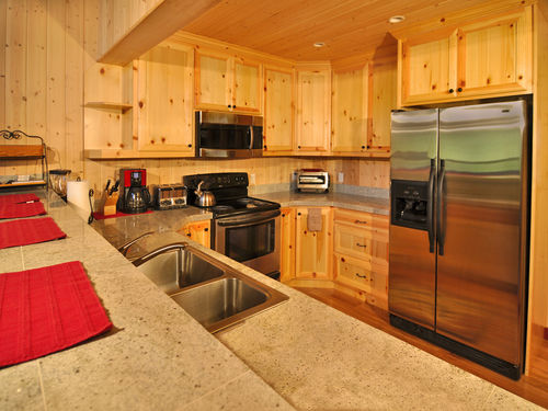 Gourmet kitchen with stainless steel appliances.