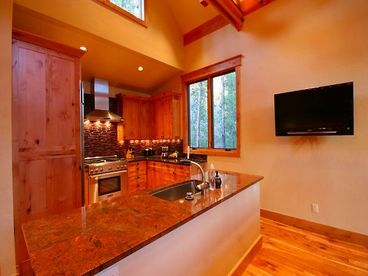 Gourmet full kitchen with stainless steel appliances