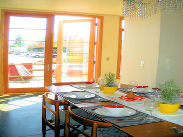 Dining Room & French Door Leading to the Deck