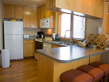 New update kitchen wood floor, fridge, and microwave.