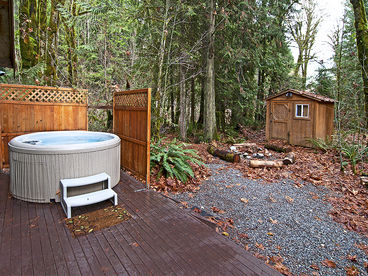 Hot tub on deck, with nearby fire pit.