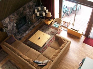 Living room with fireplace from large loft