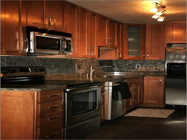 Newly remodeled kitchen with full size appliances. 