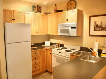 Fully equipped kitchen in this condo