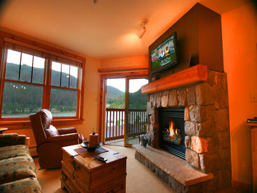 Great fireplace place mountain views TV