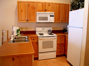 Full kitchen with all the plates, cups etc.