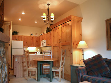 Looking towards kitchen and murphy bed