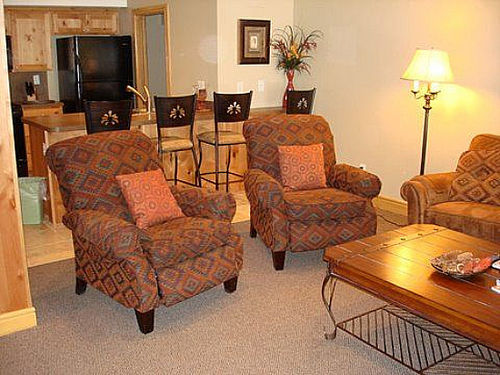 Living Room View of Snack Bar and Kitchen