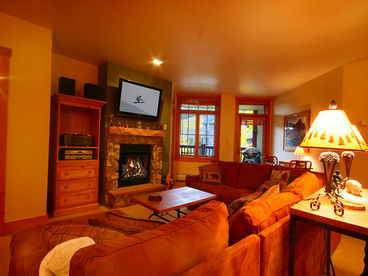 Flat screen TV above the gas fireplace