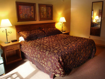 Comfortable king size bed in main area