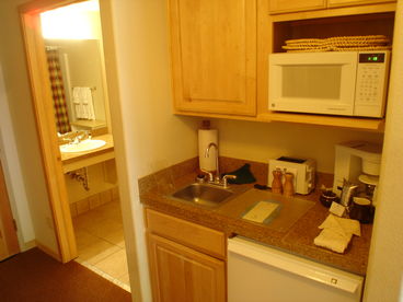 Kitchenette with fridge