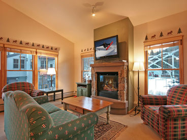 Living area with flat screen TV & fireplace