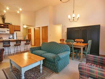 Open living area with high ceilings