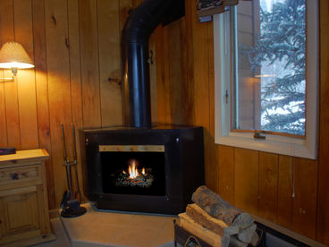 Cozy natural wood burning fireplace
