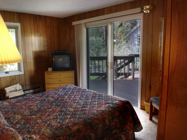 Bedroom area with access to shared deck