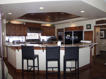 Fully Equipped Kitchen with Snack Bar Seating for 3