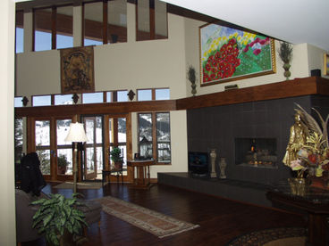 Gas Fireplace with Large Floor to Ceiling Windows