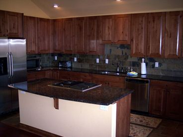 Beautiful full kitchen with granite