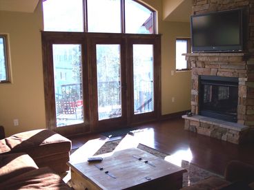 Living room with fireplace and flat screen