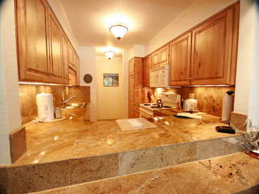 Fully Equipped Kitchen with Granite Counter