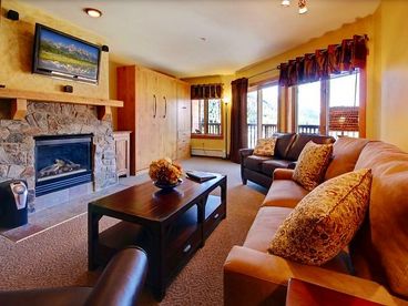 Stone fireplace and flat screen TV