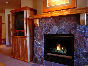 Beautiful Stone Fireplace in Living Area