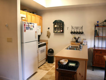 Kitchen open to Living & Dining Area