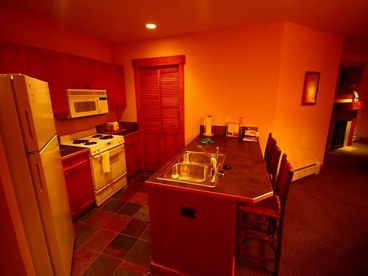 Bar seating at the kitchen counter