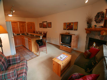 Living Area with Fireplace & TV