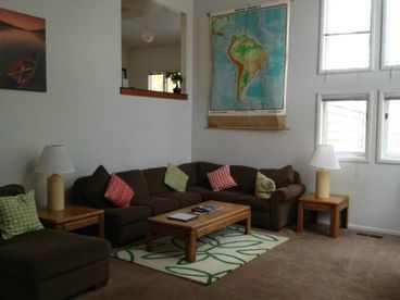 Comfortable Living Room Furnishings with Rap-around Sofa