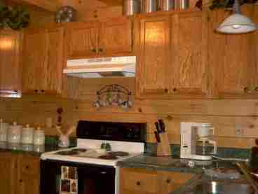 You can prepare a snack or a nine course meal in this fully equipped kitchen.