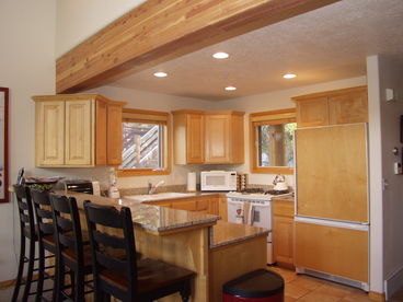 Fully Equipped Kitchen with Snack Bar Seating for 4