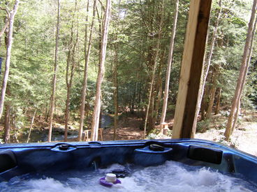view of creek from hot tub